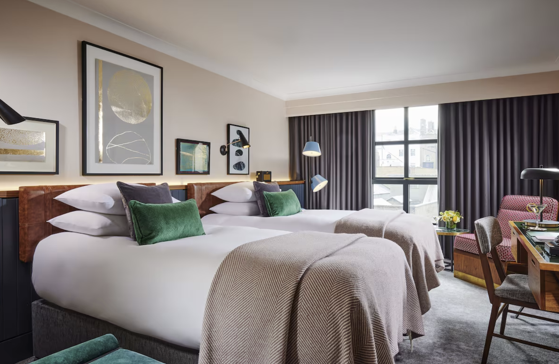The Alex Dublin boutique hotel room with modern decor, warm tones, and a king bed near Merrion Square Dublin 2