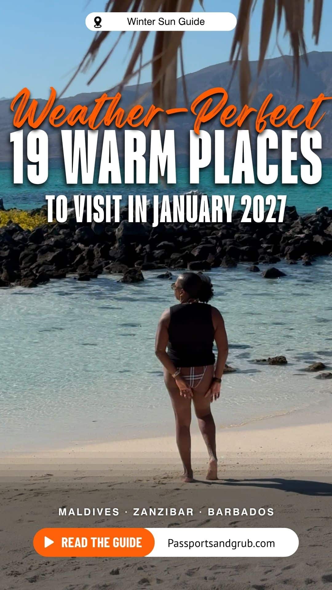 Pinterest graphic reading Weather-Perfect 19 Warm Places to Visit in January 2027, Winter Sun Guide, with a woman walking into the ocean past black volcanic rocks