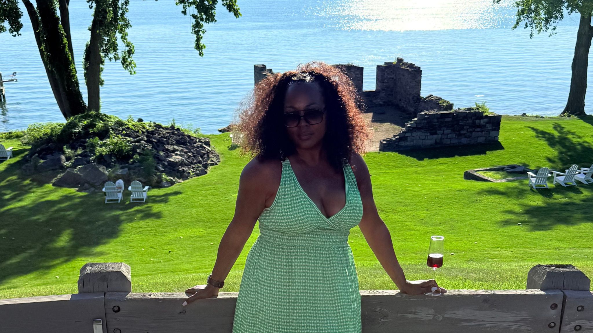 me on the lake in Cayuga lakes with wine in hand